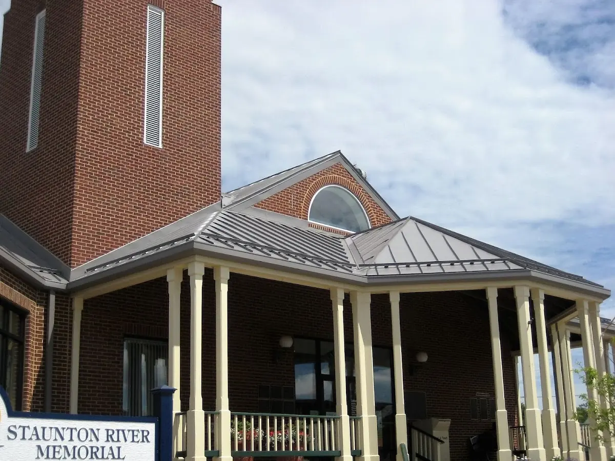 Skilled roofing craftsmen working on a residential roof in Gaffney